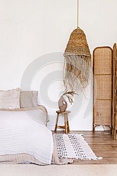 Ethnic style bedroom in home with wooden decorative elements