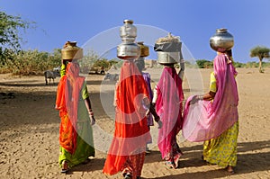 Ethnic women on the desert