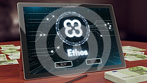 Ethos cryptocurrency logo on the pc tablet, 3D illustration