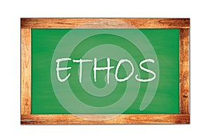 ETHOS text written on green school board