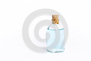 Ethyl alcohol in glass bottle isolate on white background