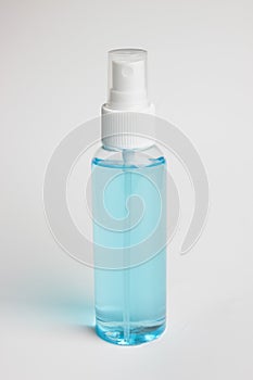 Ethyl alcohol in spray bottle on white background with clipping