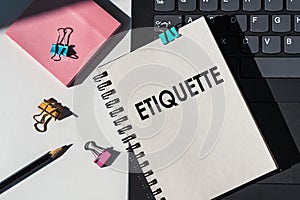 Etiquette Notebook on Desk