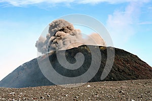 Etna crater erupting in daytime