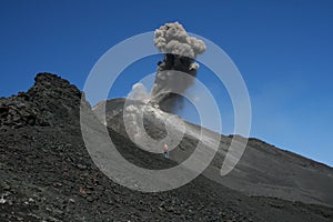 Etna erupting with photographer