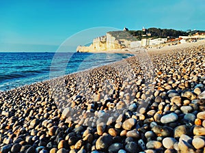 Etoeta, France - May 20, 2022: Ã‰tretat is a small resort with beautiful pebble beaches