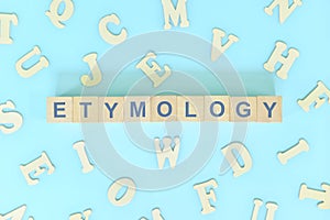 Etymology concept in English grammar and learning class lesson. Wooden blocks typography photo