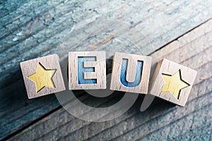 EU European Union With 2 Stars Written On Wooden Blocks On A Board