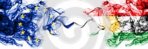 Eu, European Union vs Kurdistan, Kurdish smoky mystic flags placed side by side. Thick colored silky abstract smoke flags