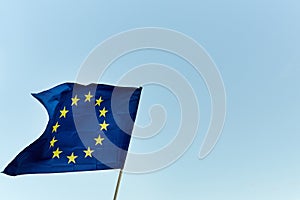 EU flag on blue sky background