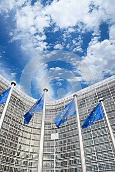 EU flags in front of Berlaymont building, Brussels, Belgium photo