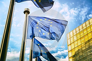 EU flags in front of European Commission in Brussels photo