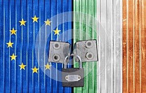 EU and Ireland flag on door with padlock