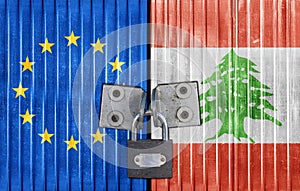 EU and Lebanon flag on door with padlock