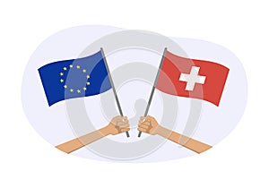 EU and Switzerland flags. Swiss and European Union symbols. Hand holding waving flag. Vector illustration