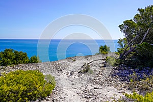 Eucate pathway dirt road sea mediterranean natural coast in french Occitanie south france