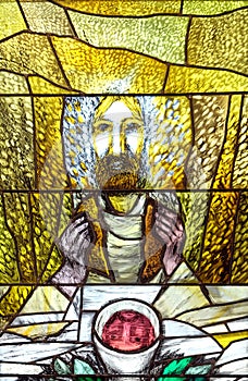 Eucharist, stained glass window by Sieger Koder in church of Saint Bartholomew in Leutershausen, Germany