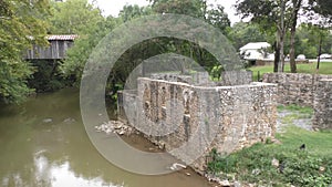 Euhralee GA  A view of the Covered Bridge and the remains of the corn mill near the Etowah River