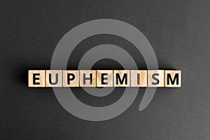 Euphemism - word from wooden blocks with letters