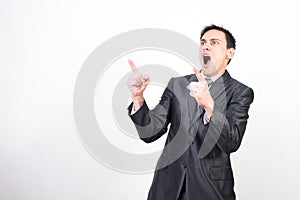 Euphoric man in suit celebrating something