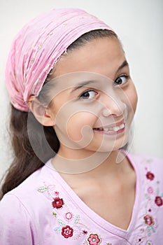 Eurasian girl in pink bandanna