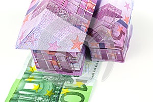 Euro bank notes House and coins