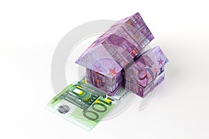 Euro bank notes House and coins