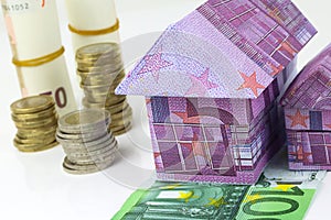 Euro bank notes House and coins