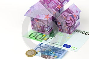 Euro bank notes House and coins