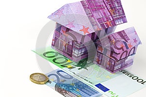 Euro bank notes House and coins