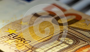 Euro banknote details in a macro shot. Closeup, selective focus. Europe finance background. Business symbol