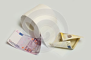 Euro banknote and toilet paper