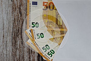 Euro banknotes close up on a white background, business and finance concept