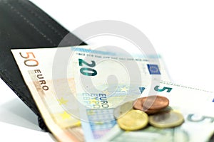 Euro banknotes and coins. Money in the wallet. Economy in Europe