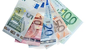 euro banknotes with different denomination and coins