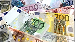 Euro banknotes flying away