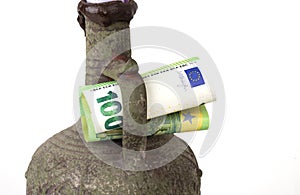 Euro banknotes in a jugful