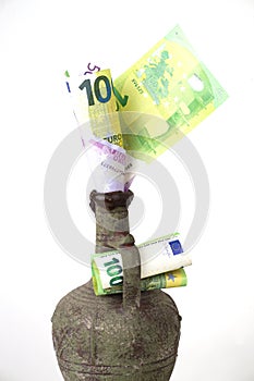 Euro banknotes in a jugful