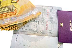 Euro banknotes and passport visa