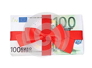 100 Euro banknotes with red ribbon isolated on white, top view. Money exchange