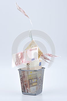 Euro banknotes in Refuse bin