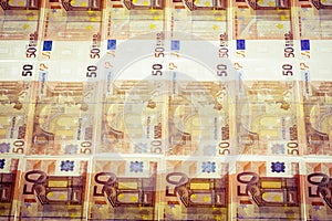 Euro banknotes side by side