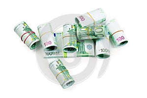 Euro banknotes in stacks and rolls isolate