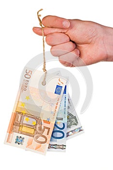 Euro banknotes tag on thumb