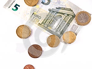 Euro bill and coin lay over the european union map photo