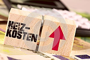 Euro bills, calculators and rising heating costs