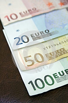 Euro bills on calendar