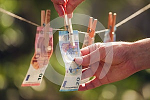 Euro bills on clothesline