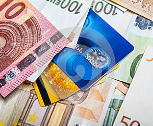 Euro bills and credit card background.