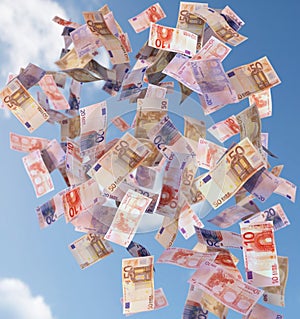 Euro bills flying in the sky